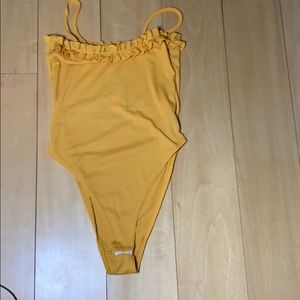 Yellow/Orange bodysuit
